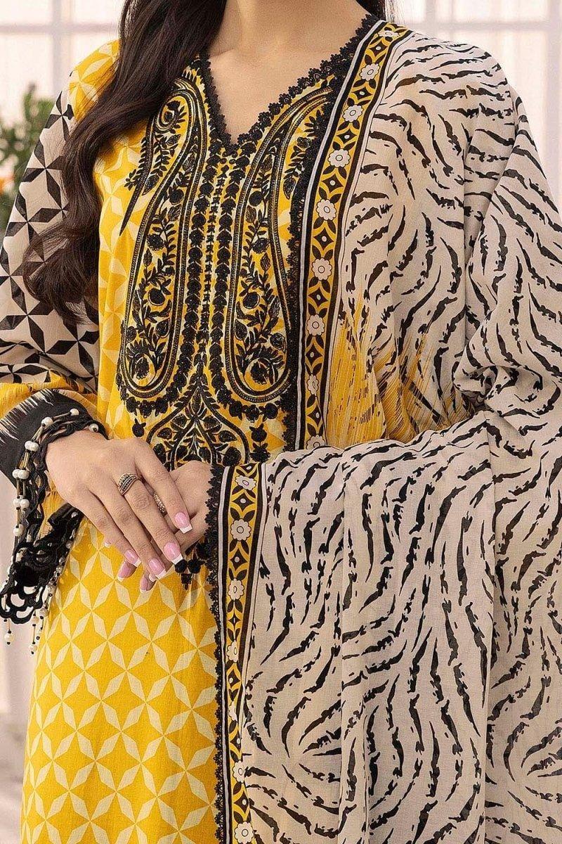 Yellow and black embroidered ethnic dress with geometric and animal print patterns