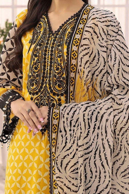 Yellow and black embroidered ethnic dress with geometric and animal print patterns
